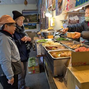 Kathi and I get lunch.  Note the bamboo plate at the far end of the counter, that is the edible memory I mentioned